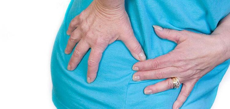 Symptom of osteoarthritis of the hip joint - pain of varying degrees of strength